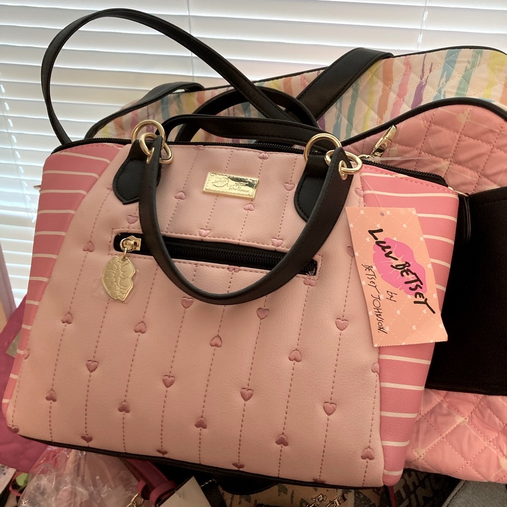 Betsey Johnson beautiful purse. I have the wallet and the tote for bundling.